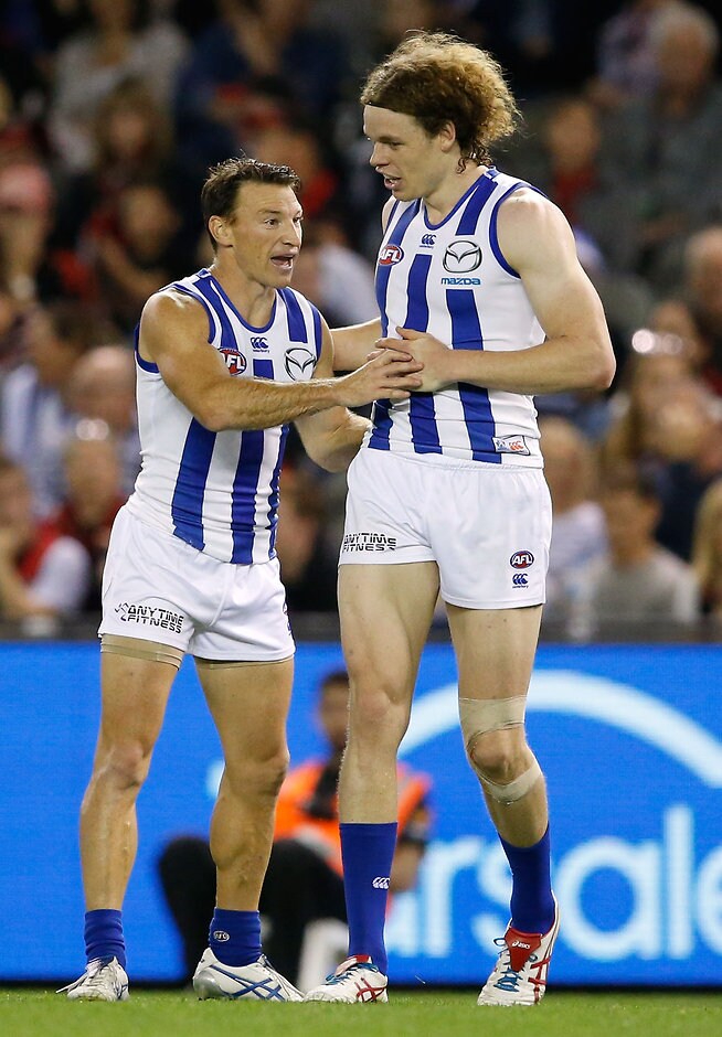 AFL 2016 Rd 08 - Essendon v North Melbourne MELBOURNE, AUSTRALIA - MAY 14: Ben Brown of the Kangaroos celebrates a goal with Brent Harvey of the Kangaroos during the 2016 AFL Round 08 match between the Essendon Bombers and the North Melbourne Kangaroos at Etihad Stadium, Melbourne on May 14, 2016. (Photo by Adam Trafford/AFL Media)